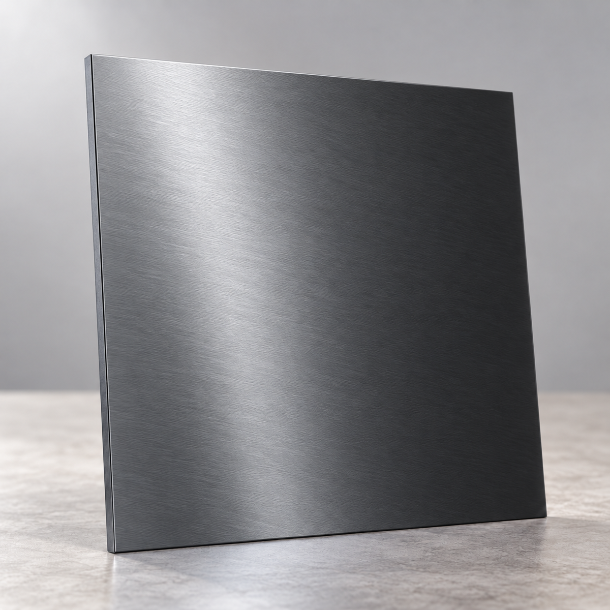 Dark Silver Metallics illustrative sample chip under overhead lighting, showing a reflective brushed finish.