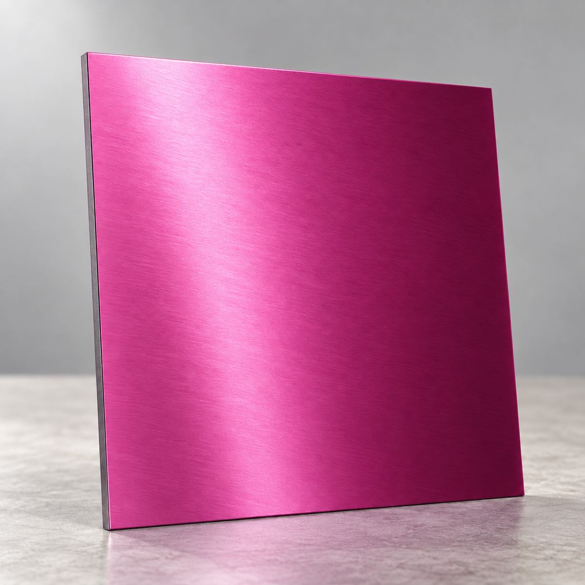 Pink Metallics illustrative sample chip under overhead lighting, showing a reflective brushed finish.